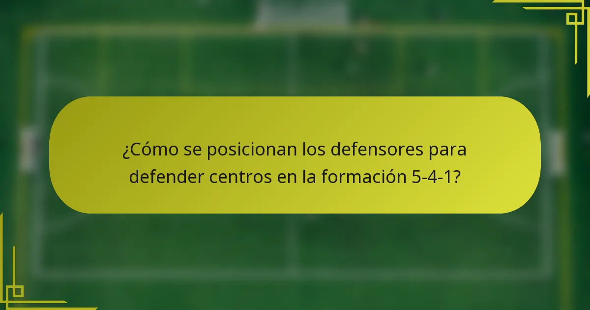 ¿Cómo se posicionan los defensores para defender centros en la formación 5-4-1?