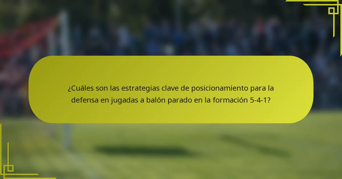 ¿Cuáles son las estrategias clave de posicionamiento para la defensa en jugadas a balón parado en la formación 5-4-1?